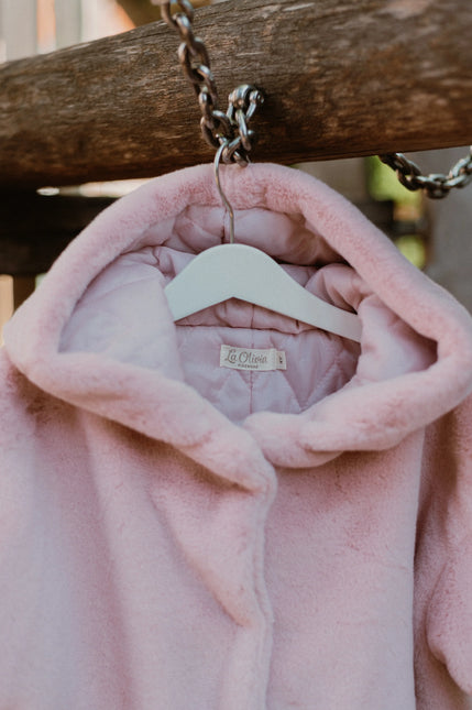 Fluffy roze winterjas met capuchon